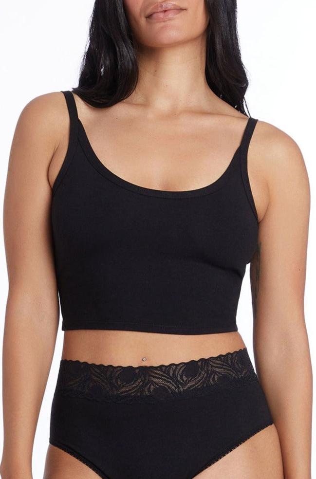 woman in black camofleur crop and high cut brief