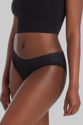 This image features the Camofleur Signature Low Rise Bikini, designed for both comfort and style. The bikini is crafted from a blend of sustainable bamboo and cotton materials, emphasizing both eco-friendliness and softness against the skin.