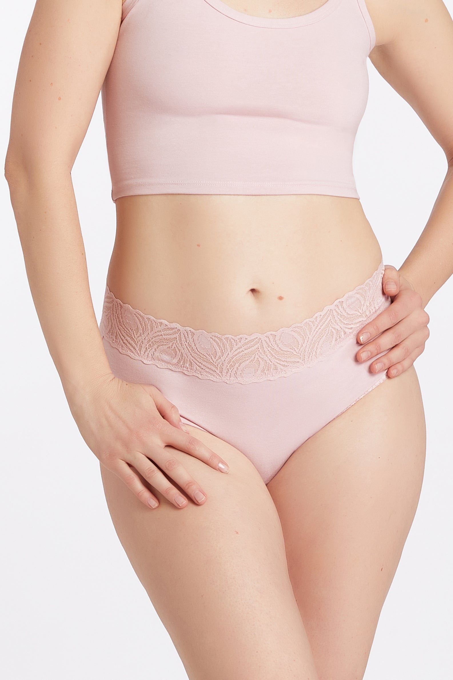 A high cut brief in pink with lace detailing on the waistband, made from a blend of bamboo and cotton materials.