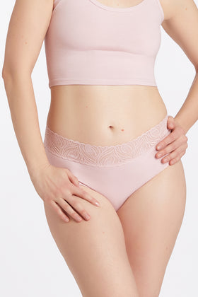 A high cut brief in pink with lace detailing on the waistband, made from a blend of bamboo and cotton materials.