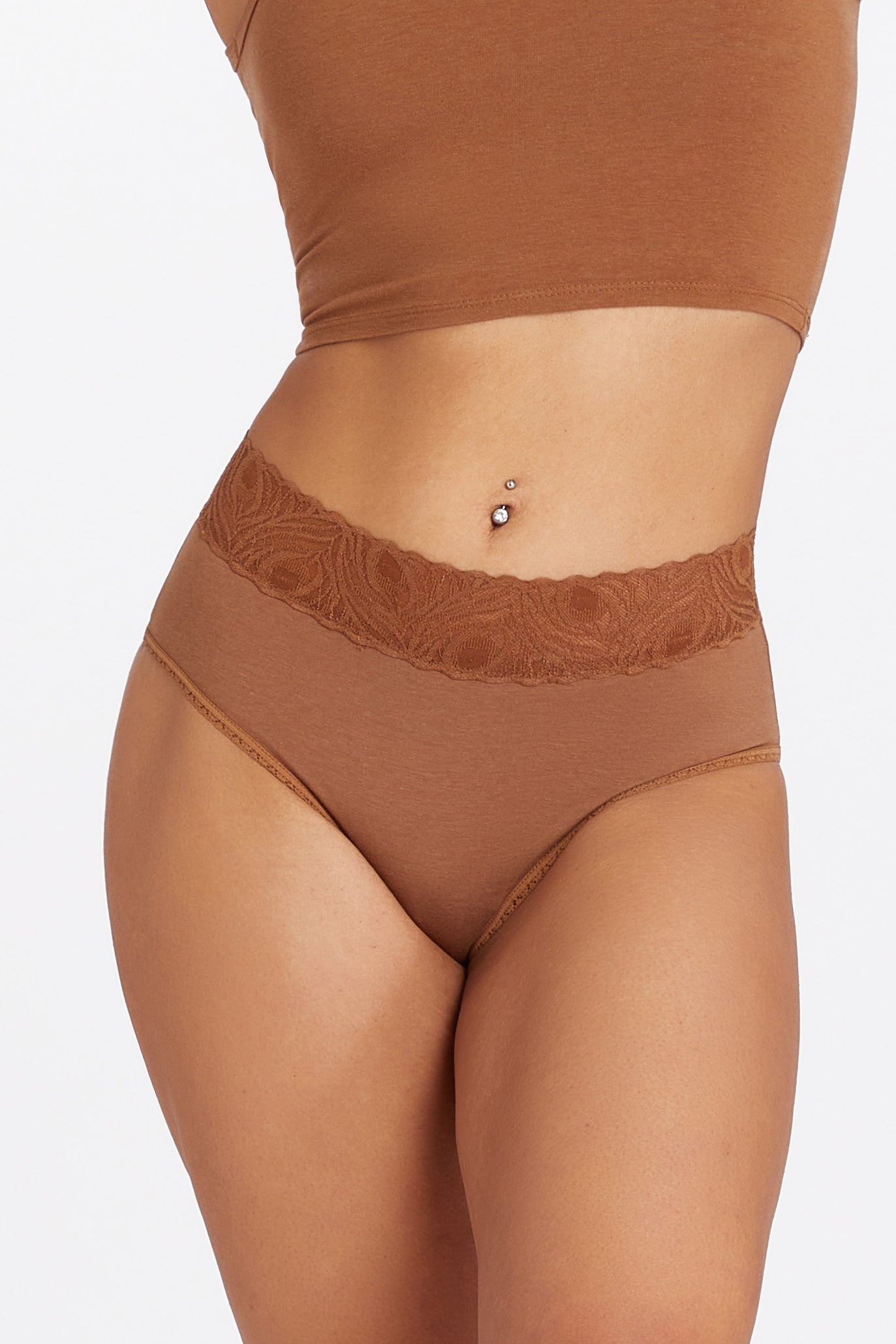 This image features the Camofleur Signature High Cut Brief, modeled in a sleek navy color. The brief is designed with sustainable bamboo and cotton materials, offering both comfort and durability.