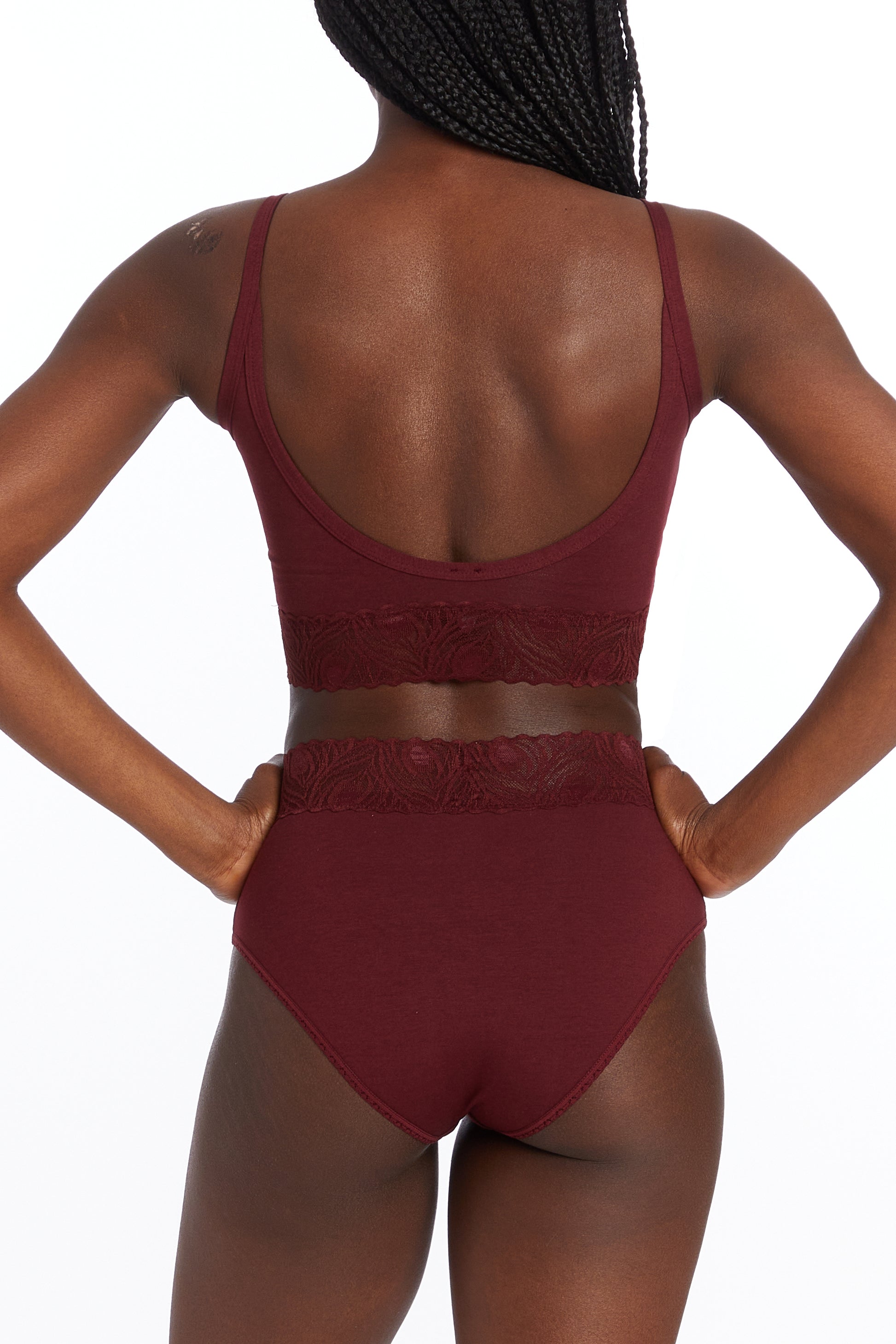 This image features the Camofleur Signature High Cut Brief, modeled in bordeaux red. The brief is designed with sustainable bamboo and cotton materials, offering both comfort and durability.