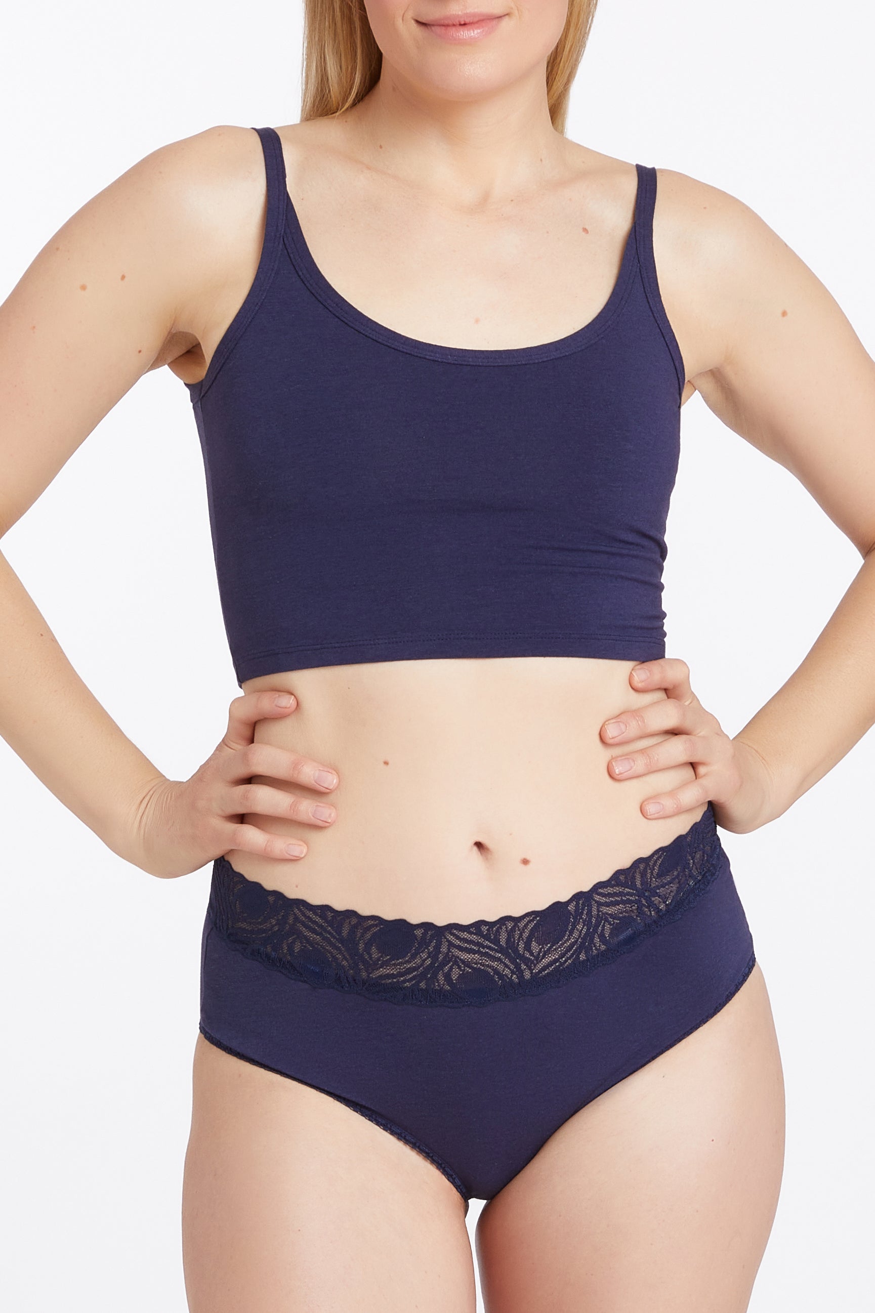 This image features the Camofleur Signature High Cut Brief, modeled in a sleek navy color. The brief is designed with sustainable bamboo and cotton materials, offering both comfort and durability.