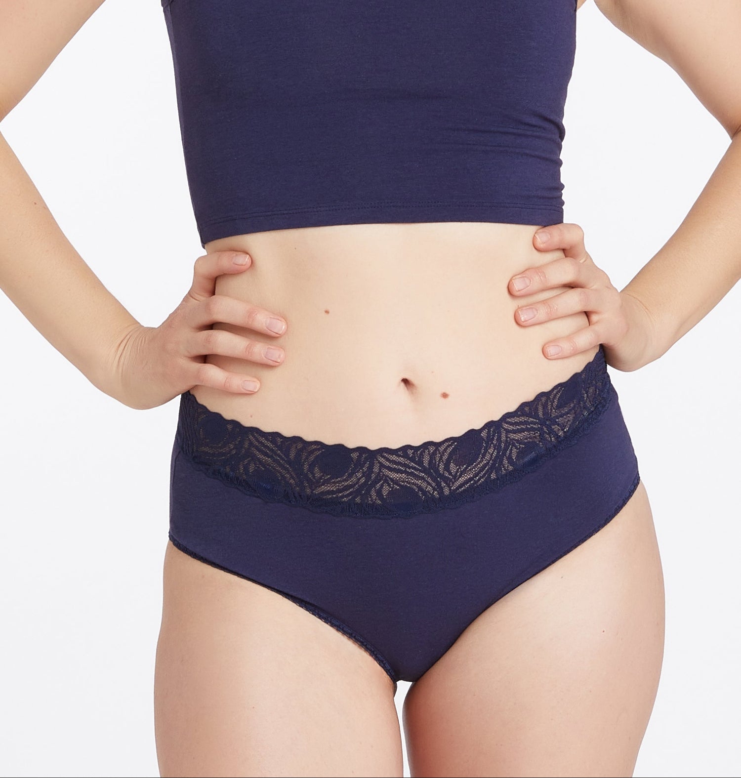 Navy blue crop and high-waisted underwear set on a white background