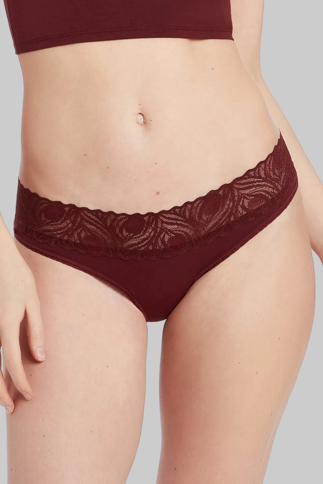 This image features the Camofleur Signature Low Rise Bikini, designed with both style and comfort in mind. The bikini is crafted from a sustainable blend of bamboo and cotton, evident in its soft and natural appearance.